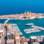 Aerial view of Valletta, Malta's capital city, showcasing the harbor and historic architecture that makes it an attractive business hub in the Mediterranean